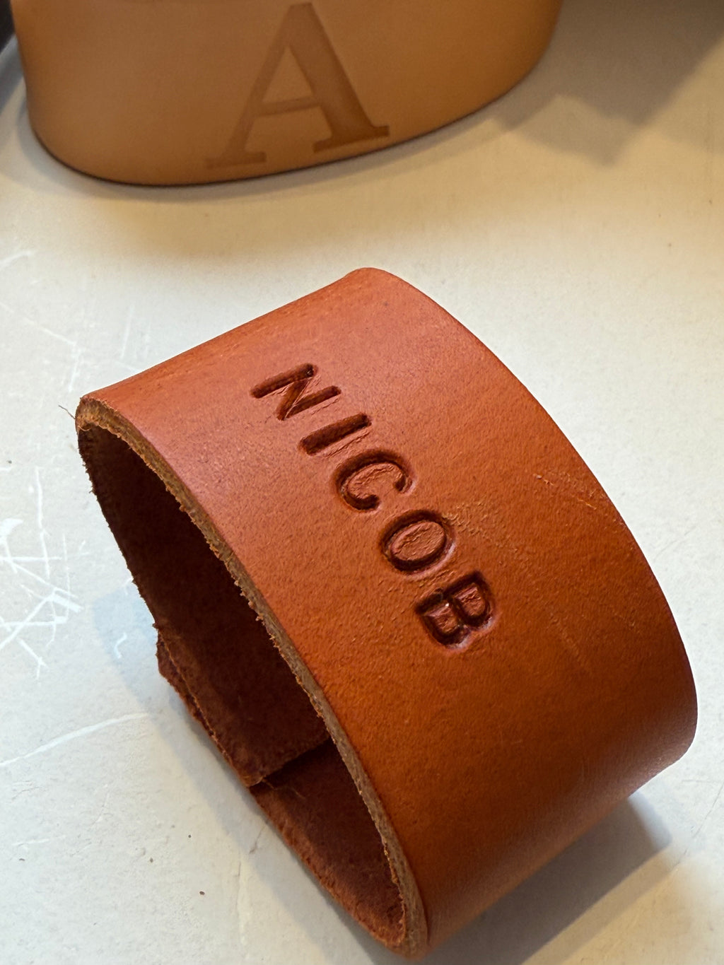 Personalized Leather Napkin Ring with Hand Engraving