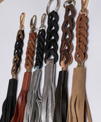 Porte-clés ou breloques de sac à pompon en cuir