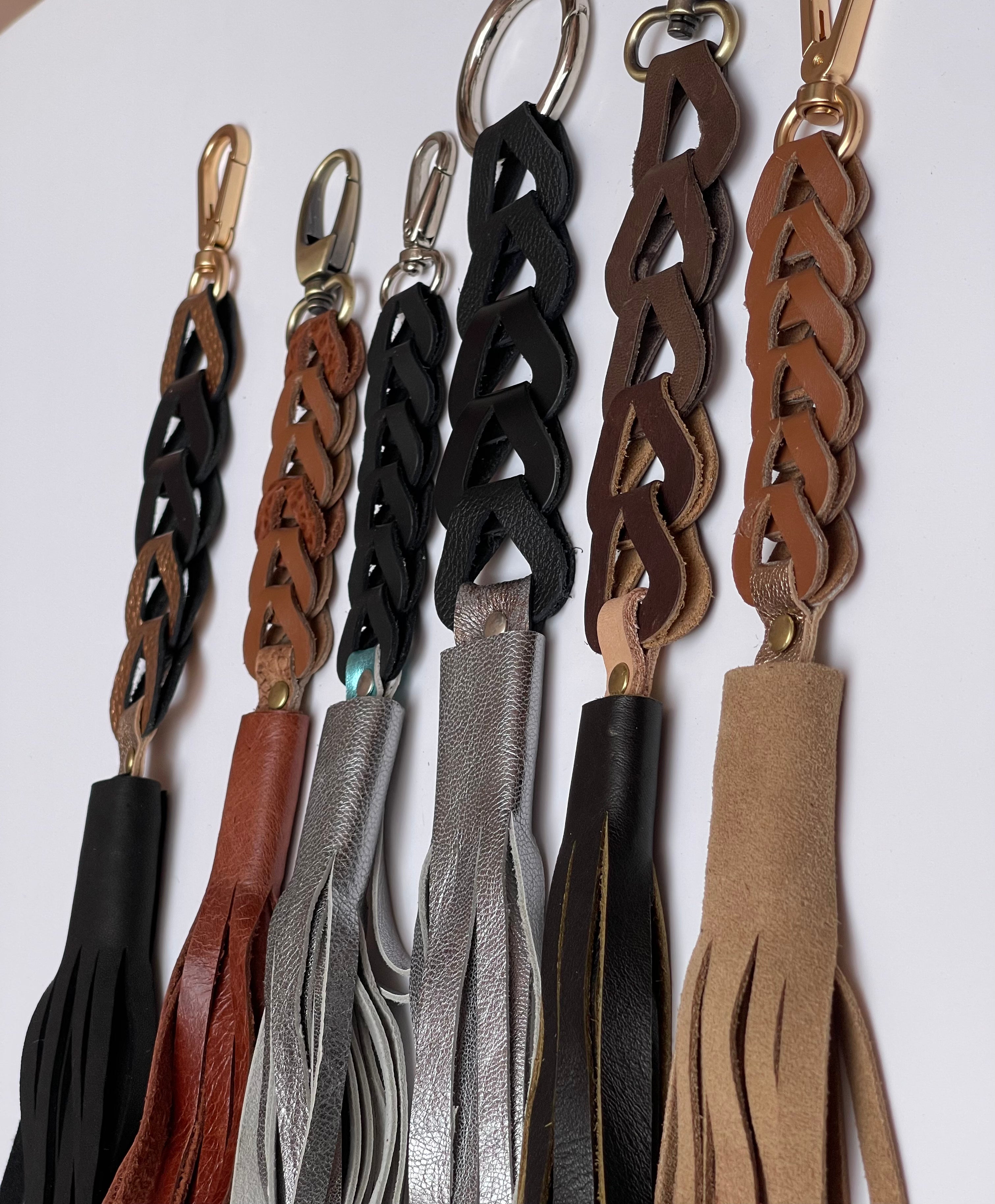 Porte-clés ou breloques de sac à pompon en cuir