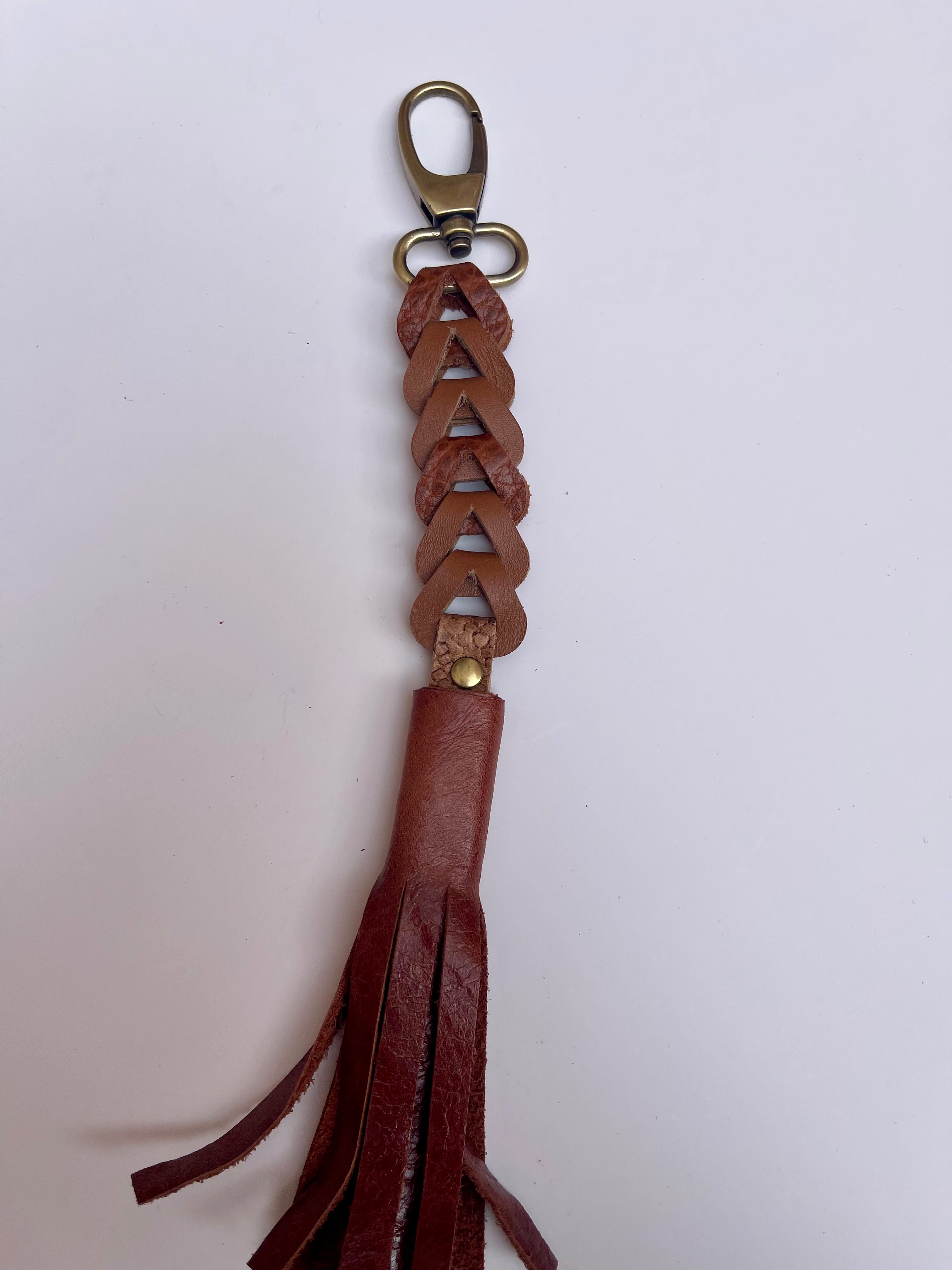 Porte-clés ou breloques de sac à pompon en cuir