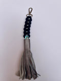 Sleutelhangers of Charms voor tassen met leren kwast