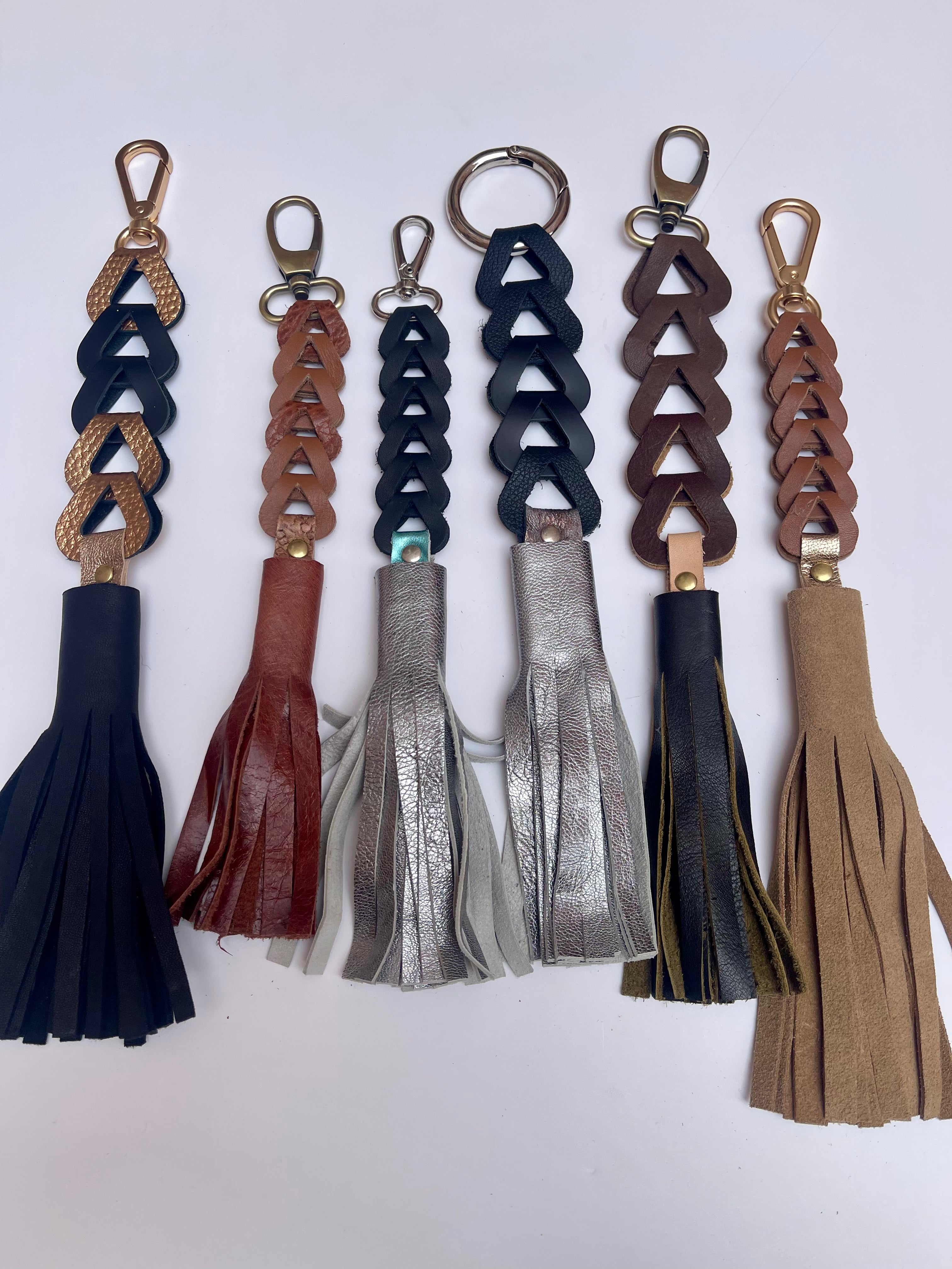 Porte-clés ou breloques de sac à pompon en cuir