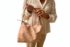 Leather bag with star embroidery.